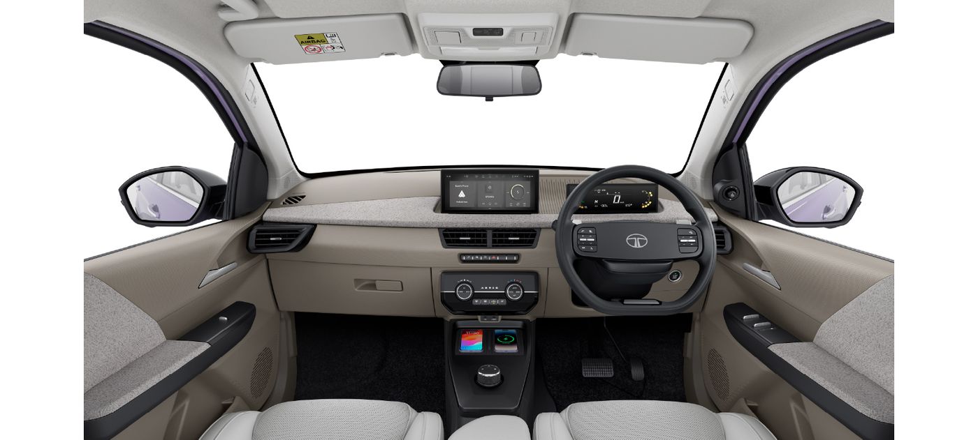 The Aeris dashboard from the front seats, with a floating centre screen, a digital driver display and textured facia